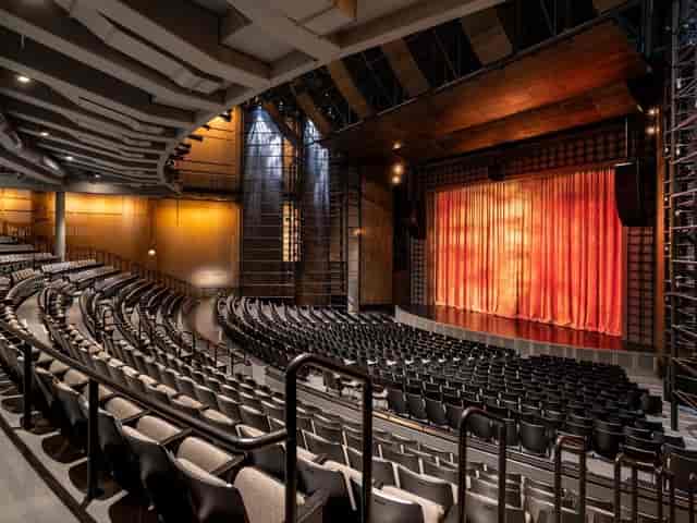 Modern auditorium with tiered seating in Harris Theater for events and performances.
