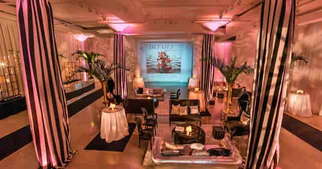 Coat Room at Chez Event Venue: elegant space with striped drapery for corporate events.