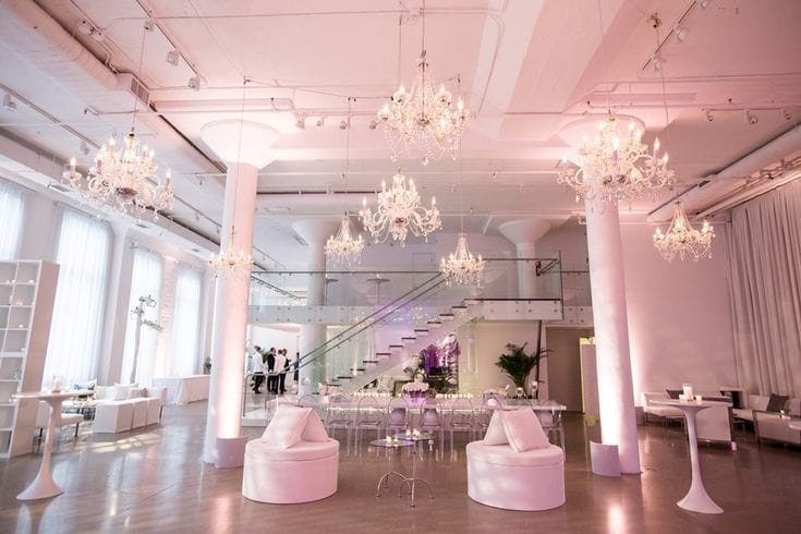 Coat Room at Chez Event Venue with elegant chandeliers, perfect for upscale gatherings.