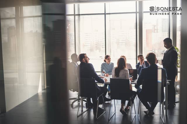 Modern meeting room at Sonesta, featuring natural light for corporate workshops.
