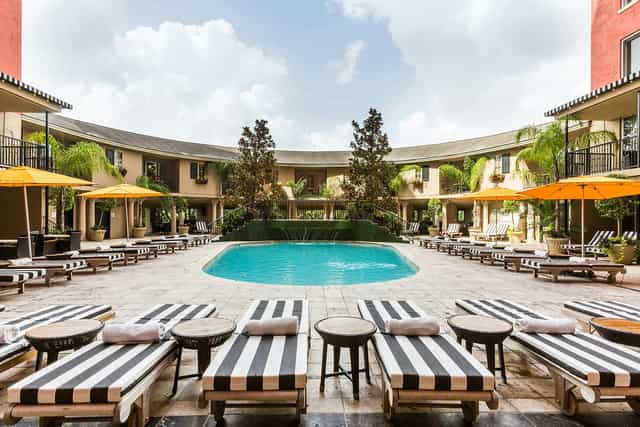 Phantom Ballroom pool at Hotel ZaZa, vibrant outdoor venue for events and networking.