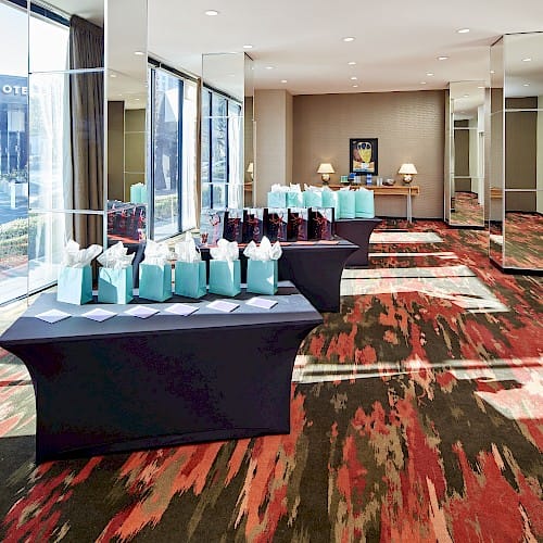 Spindletop Breakout at Hotel Derek: elegant event space with gift bags for networking.