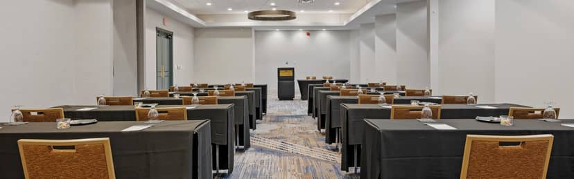 Conference center in Crowne Plaza Houston with classroom-style setup for professional events.