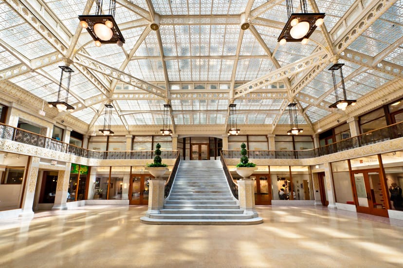 Light Court in The Rookery: elegant event space with grand staircase and glass ceiling.