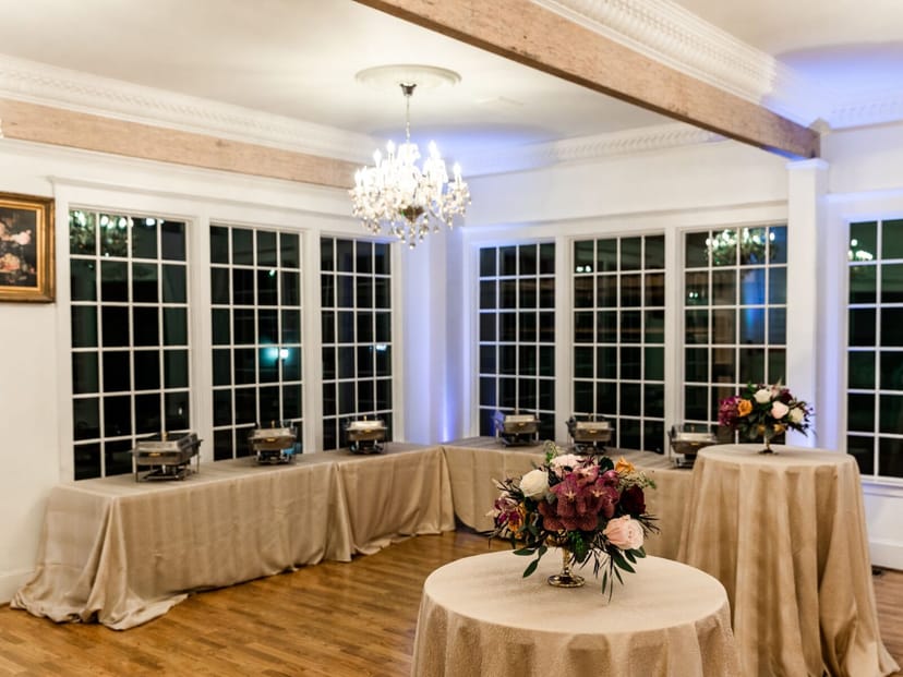 Elegant dining area at Sara's Inn with chandelier, perfect for events and celebrations.