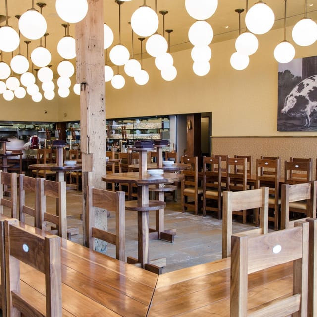 Spacious rustic bar at The Publican, perfect for networking events and gatherings.