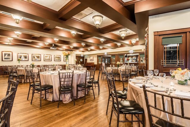 Elegant event space with round tables, ideal for formal dinners and receptions.