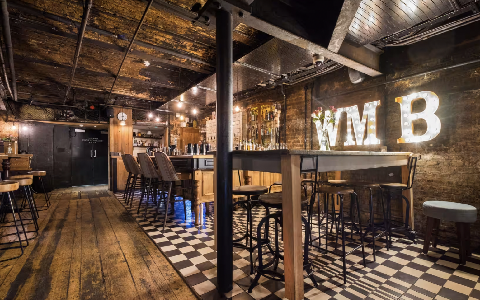 Stylish rustic event space at WN Barkers, ideal for gatherings and networking events. - Banner