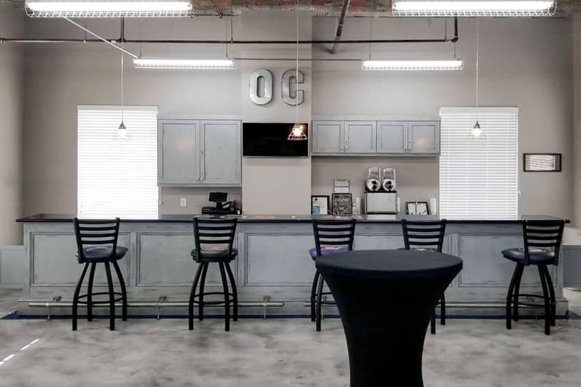 Modern event space at Buffalo Soldiers Museum with sleek bar, ideal for gatherings.
