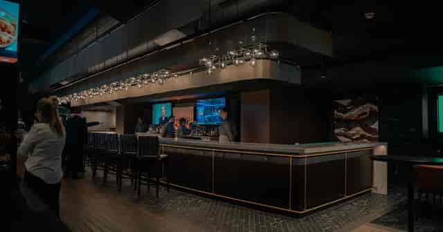 Lexus Lounge bar in Houston Toyota Center, modern design for networking events and gatherings.