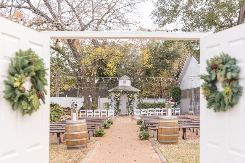 Gazebo in Butler's Courtyard, adorned for a wedding with rustic decor and string lights.