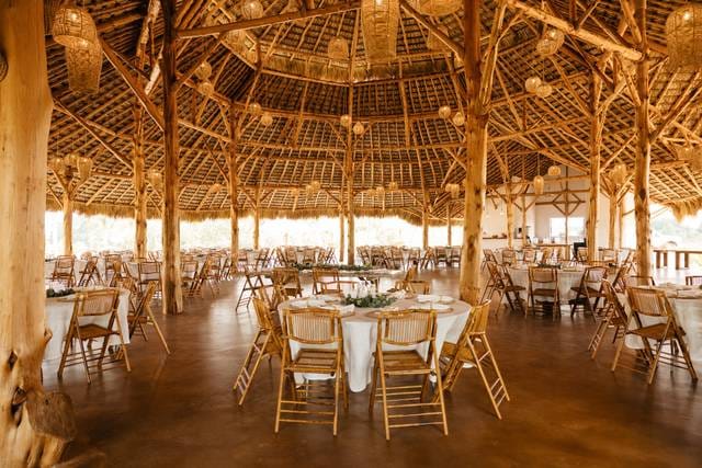 Event Hall in The Bougainvilleas with rustic wooden beams, ideal for weddings and gatherings.