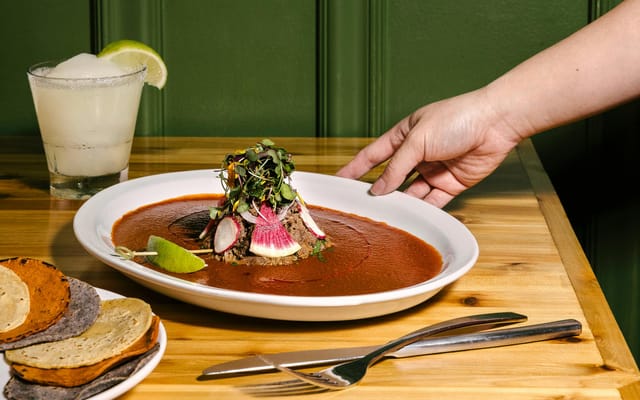 Plated dish in The West Wing at Hugo's, perfect for catering events and celebrations.
