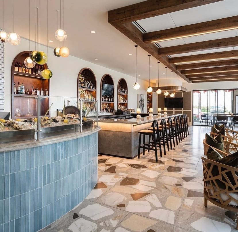 Private events area at Masraff's with sleek bar, ideal for gatherings and networking.