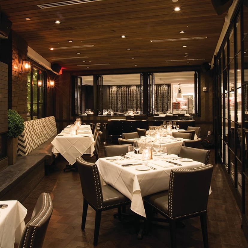 Elegant West Terrace Dining Room at Steak 48, perfect for corporate events and private dinners.