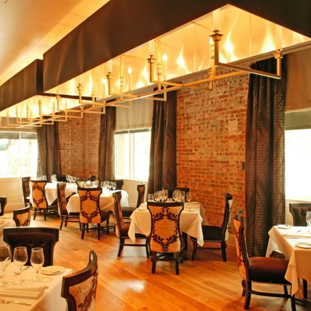 Elegant Solarium at Brennan's of Houston, ideal for intimate gatherings and corporate events.