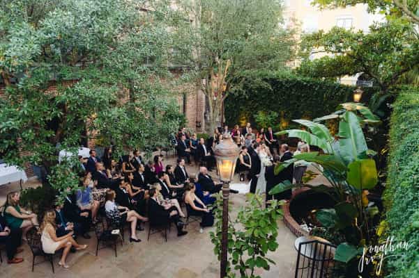 Courtyard Balcony at Brennan's of Houston, lush greenery, outdoor event space for gatherings.