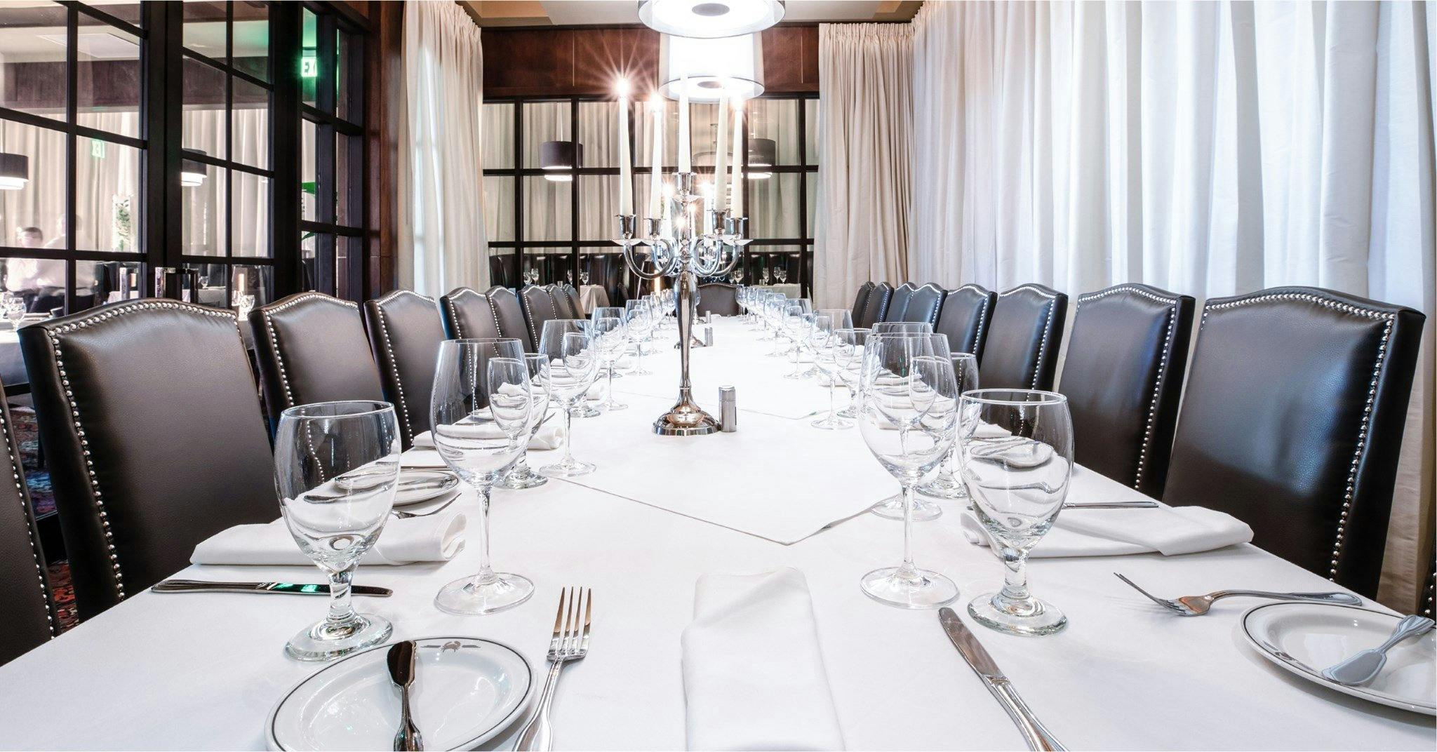 Elegant dining table in Naples Room, Truluck's Houston for formal events and gatherings.