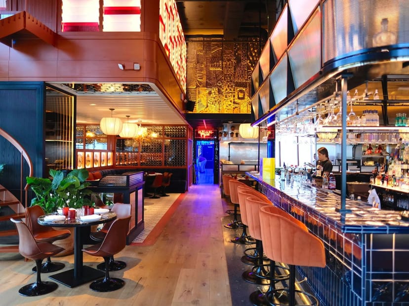 Vibrant BCN Taste & Tradition restaurant with stylish bar, perfect for events and gatherings.