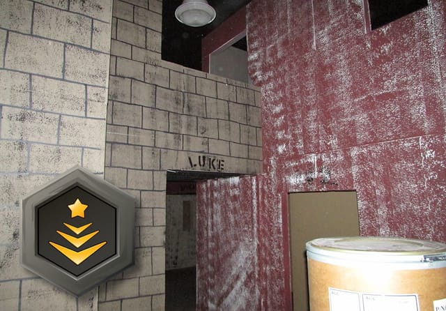 Indoor laser tag venue with industrial decor, perfect for team-building events.