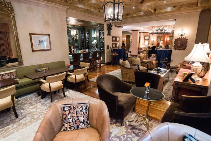Sophisticated hotel bar with plush seating, ideal for networking events and meetings.