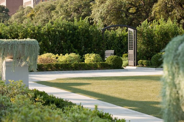 Celebration Garden archway in McGovern Centennial Gardens, perfect for weddings and events.