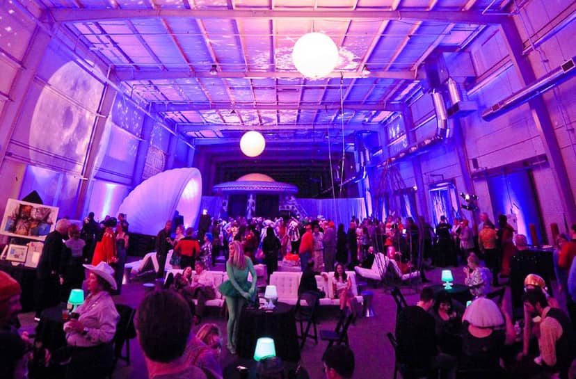 Vibrant art studio event space with unique decor for networking and social gatherings.