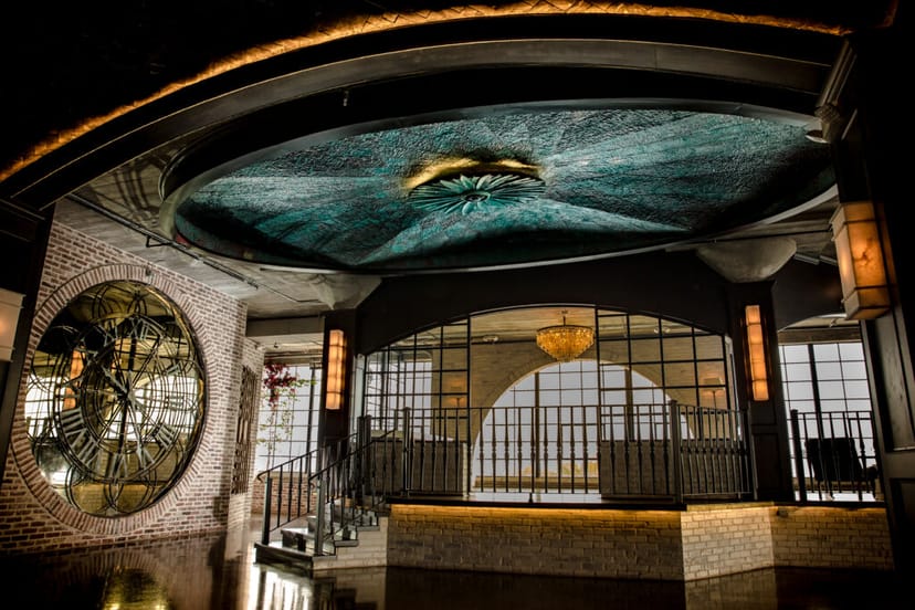 Stylish Lexington Lounge with striking ceiling, perfect for upscale events and gatherings.