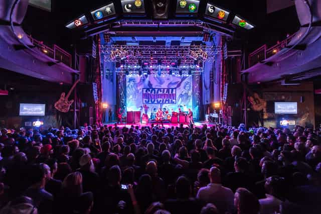 Banquet hall at House of Blues Houston with vibrant stage for concerts and corporate events.