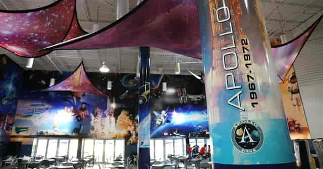 Vibrant cosmic-themed event space at Space Center Houston for innovative meetings.