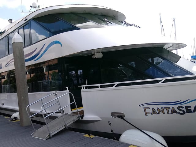 Sleek FantaSea yacht at Kemah Boardwalk, ideal for upscale events and weddings.