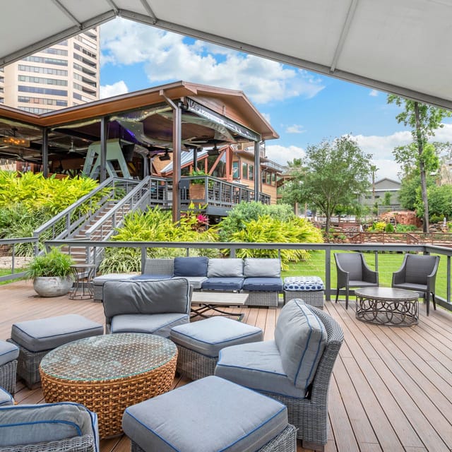 Outdoor venue at Brenner's On The Bayou with lush greenery for casual events.