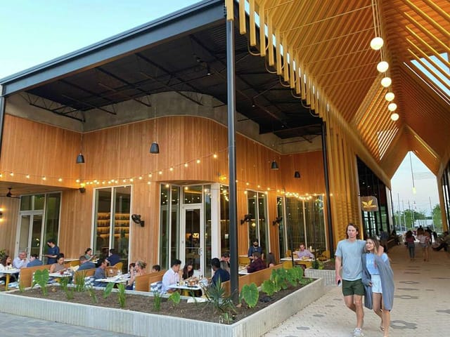 Vibrant outdoor dining at The Lower Deck, ideal for summer networking events.