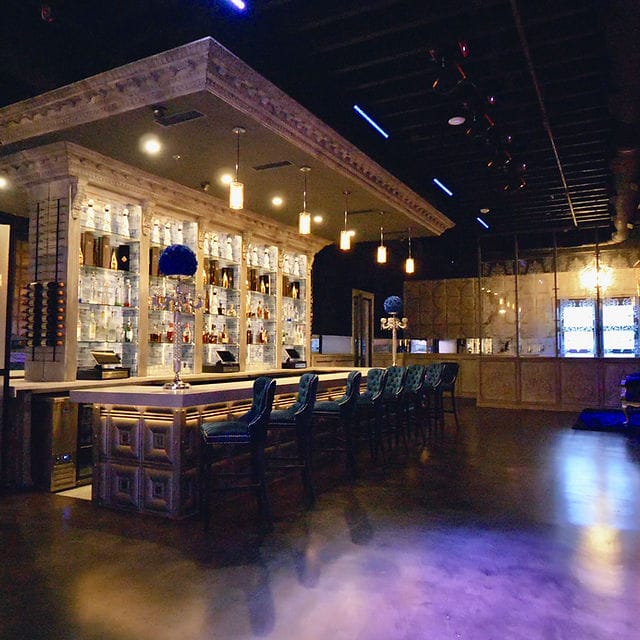Stylish bar area in Private Lounge, ideal for networking events and cocktail receptions.