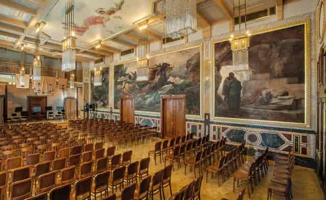 Elegant Prague Hall event space with murals, ideal for conferences and formal gatherings.