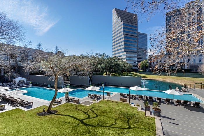 River Oaks outdoor venue at Omni Houston Hotel with sleek pool, ideal for events and receptions.