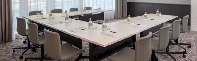 U-shaped conference room at Staybridge Suites Dubai, perfect for meetings and events.
