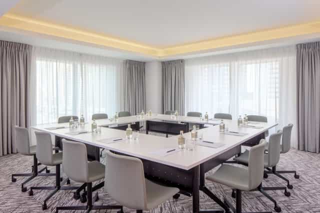 Modern conference room in Staybridge Suites Dubai, ideal for corporate meetings and workshops.