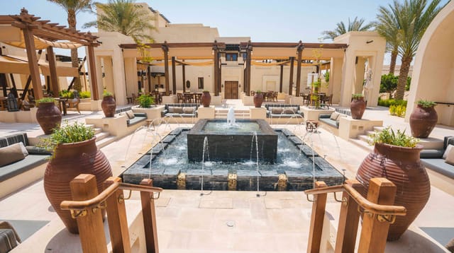 Desert Resort in Al Wathba with fountain, ideal for corporate events and receptions.