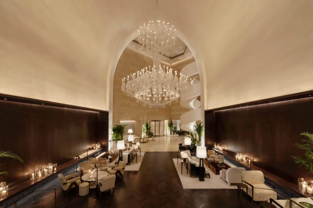 Luxurious Dubai EDITION Studio 3 venue with elegant chandeliers for corporate events.