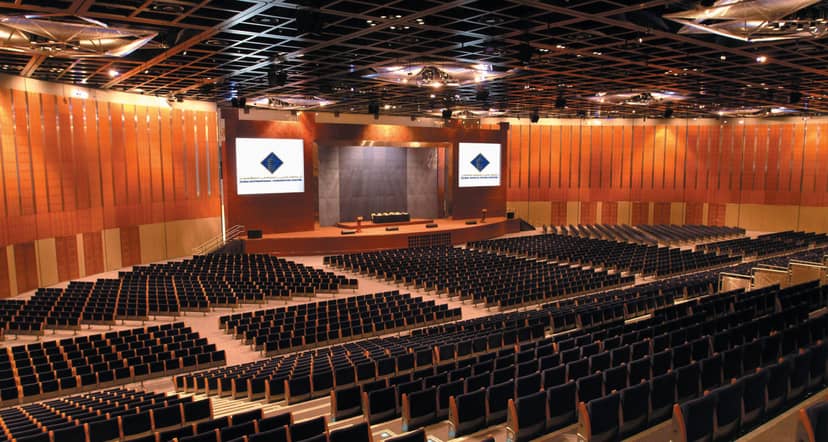 Spacious Dubai convention hall with tiered seating for conferences and corporate events.