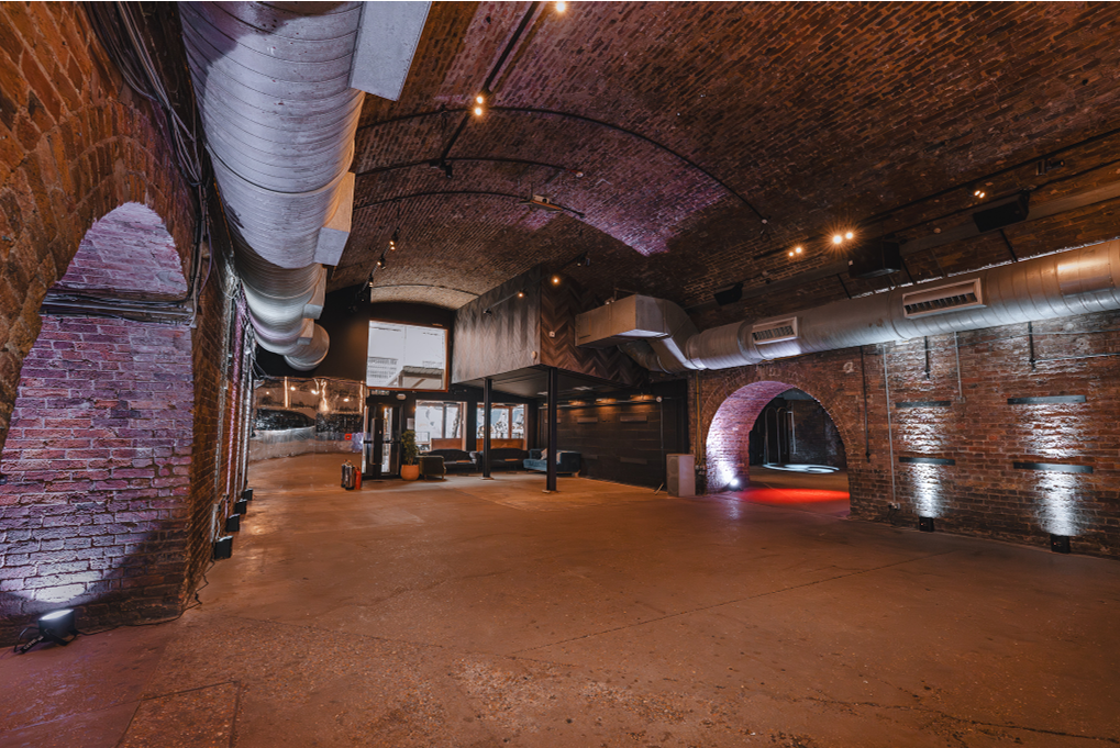 Industrial Rivington St event space, exposed brick, brand activation - Banner