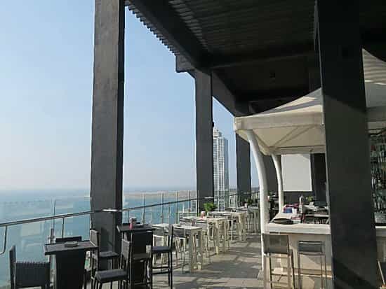 Stylish rooftop terrace at Mövenpick Hotels, perfect for upscale events and gatherings.