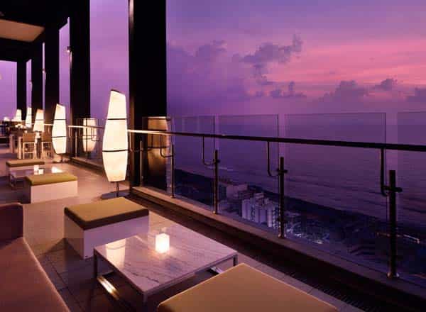 Rooftop terrace at Mövenpick Hotels, ocean view sunset venue for upscale events.