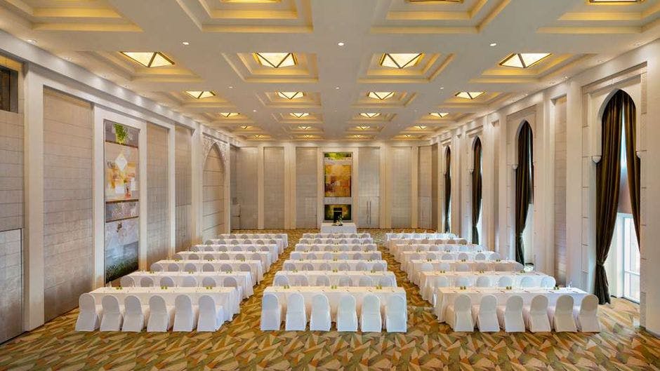 Conference setup at Shangri-La Hotel Dubai with elegant decor and seating.