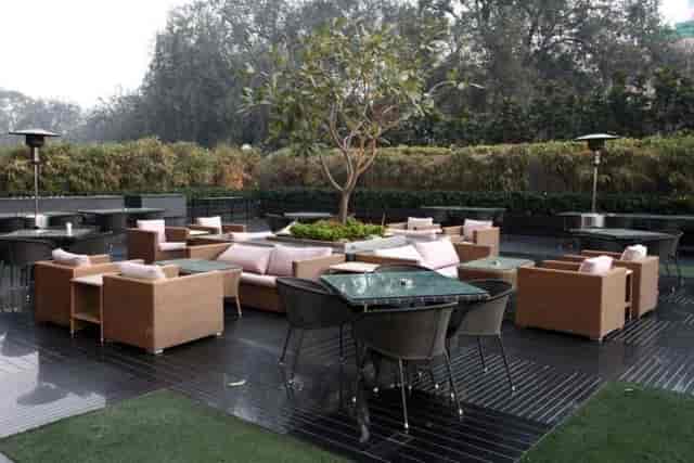 Plaza Terrace Garden lounge with modern furniture for networking events in New Delhi.