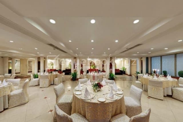 Chandragupt Hall at Hotel Samrat, elegant wedding and corporate event space with stylish decor.