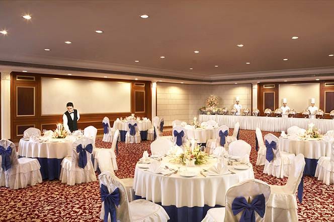 Elegant banquet hall at Hotel The Royal Plaza, perfect for weddings and corporate events.