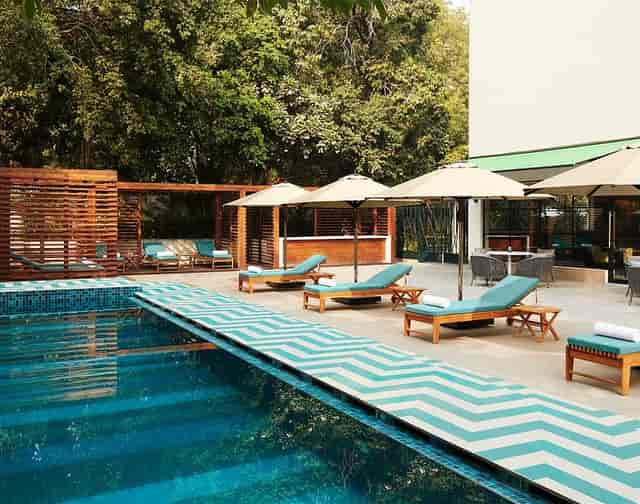 Serene poolside at The Deck, Connaught; ideal for outdoor events and networking.
