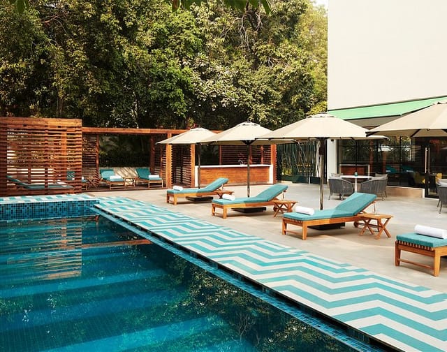 Serene poolside at The Deck, Connaught; ideal for outdoor events and networking.